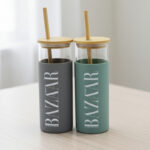 Bamboo Glass Tumblers with Silicone Handle - Drinkware corporate gifts for corporate gifting in Singapore with custom logo branding.Bamboo glass tumblers with silicone handle, combining eco-friendliness with modern design. These durable and stylish tumblers offer a comfortable grip for everyday use.