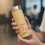 Bamboo Tumbler - Drinkware corporate gifts for corporate gifting in Singapore with custom logo branding.This eco-friendly bamboo tumbler offers a sustainable way to enjoy your beverages, combining natural materials with a sleek design for everyday use.