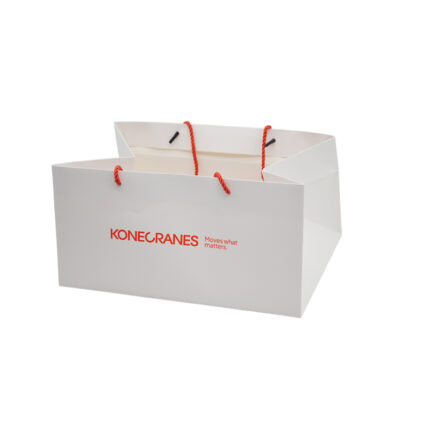 White Card Paper Bag - custom packaging for corporate gifting in Singapore with custom logo branding. It is commonly used for retail packaging and branding.