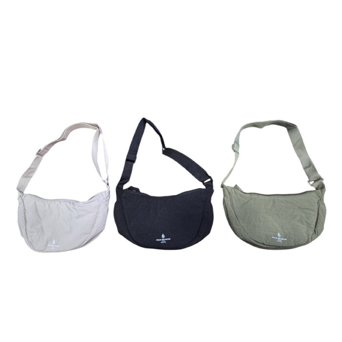 Half Moon Sling Bag - branded bags and pouches for corporate gifting in Singapore with custom logo branding. Half moon sling bag features a sleek, curved design that offers a stylish, compact look.