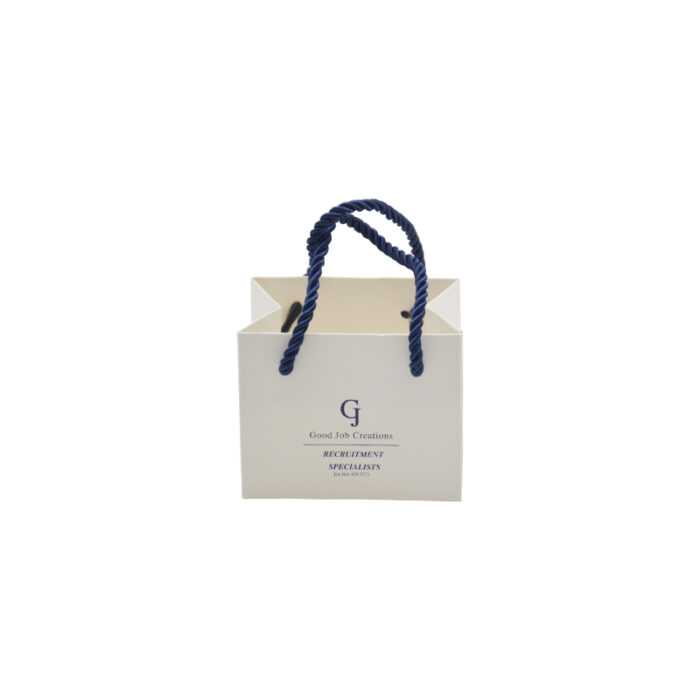 White Card Paper Bag - custom packaging for corporate gifting in Singapore with custom logo branding. It is commonly used for retail packaging and branding.