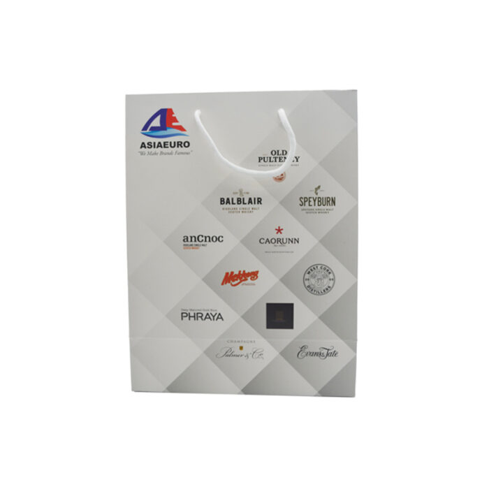 White Card Paper Bag - custom packaging for corporate gifting in Singapore with custom logo branding. It is commonly used for retail packaging and branding.