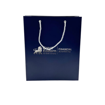White Card Paper Bag - custom packaging for corporate gifting in Singapore with custom logo branding. It is commonly used for retail packaging and branding.
