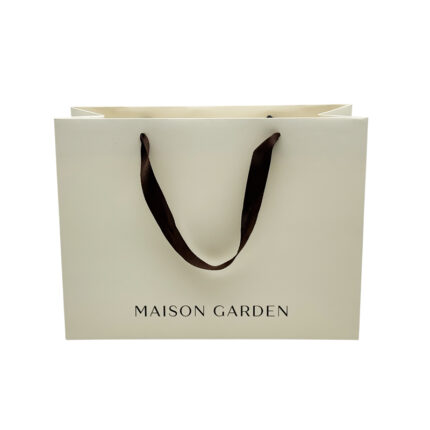 White Card Paper Bag - custom packaging for corporate gifting in Singapore with custom logo branding. It is commonly used for retail packaging and branding.
