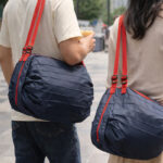 Large Compact Foldable Shopping Bag - branded bags and pouches for corporate gifting in Singapore with custom logo branding. The Large Compact Foldable Shopping Bag is a spacious, eco-friendly bag that folds neatly for easy storage.