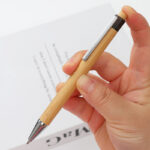 Bamboo Click Pen - Stationery corporate gifts for corporate gifting in Singapore with custom logo branding. Bamboo Click Pen is an eco-friendly writing essential crafted from sustainably sourced bamboo, blending modern functionality with natural elegance.