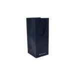 White Card Paper Bag - custom packaging for corporate gifting in Singapore with custom logo branding. It is commonly used for retail packaging and branding.