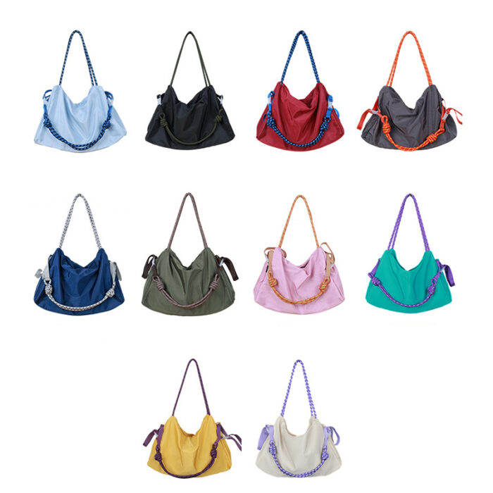 Dual Tone Nylon Gym Bag —- branded bags and pouches for corporate gifting in Singapore with custom logo branding. Crossbody sling bag offers a hands-free, practical way to carry your essentials.