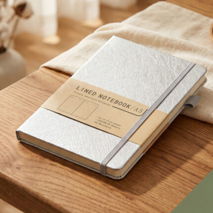 Dupont Notebook- Stationery corporate gifts for corporate gifting in Singapore with custom logo branding.A5 PU notebook with a sleek, professional design, perfect for jotting down notes or ideas. Its durable cover and compact size make it an ideal choice for on-the-go use.