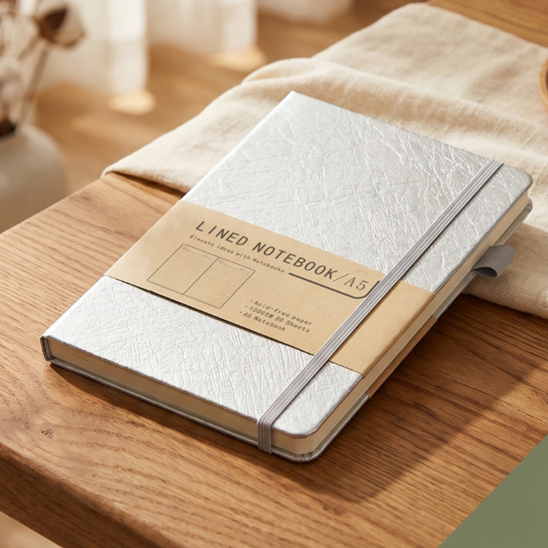 Dupont Notebook- Stationery corporate gifts for corporate gifting in Singapore with custom logo branding.A5 PU notebook with a sleek, professional design, perfect for jotting down notes or ideas. Its durable cover and compact size make it an ideal choice for on-the-go use.